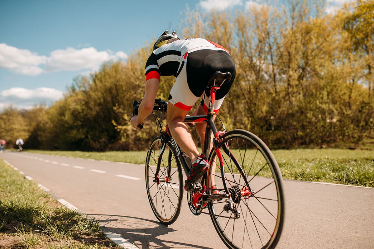 Cyclist rides on bicycle speed effect